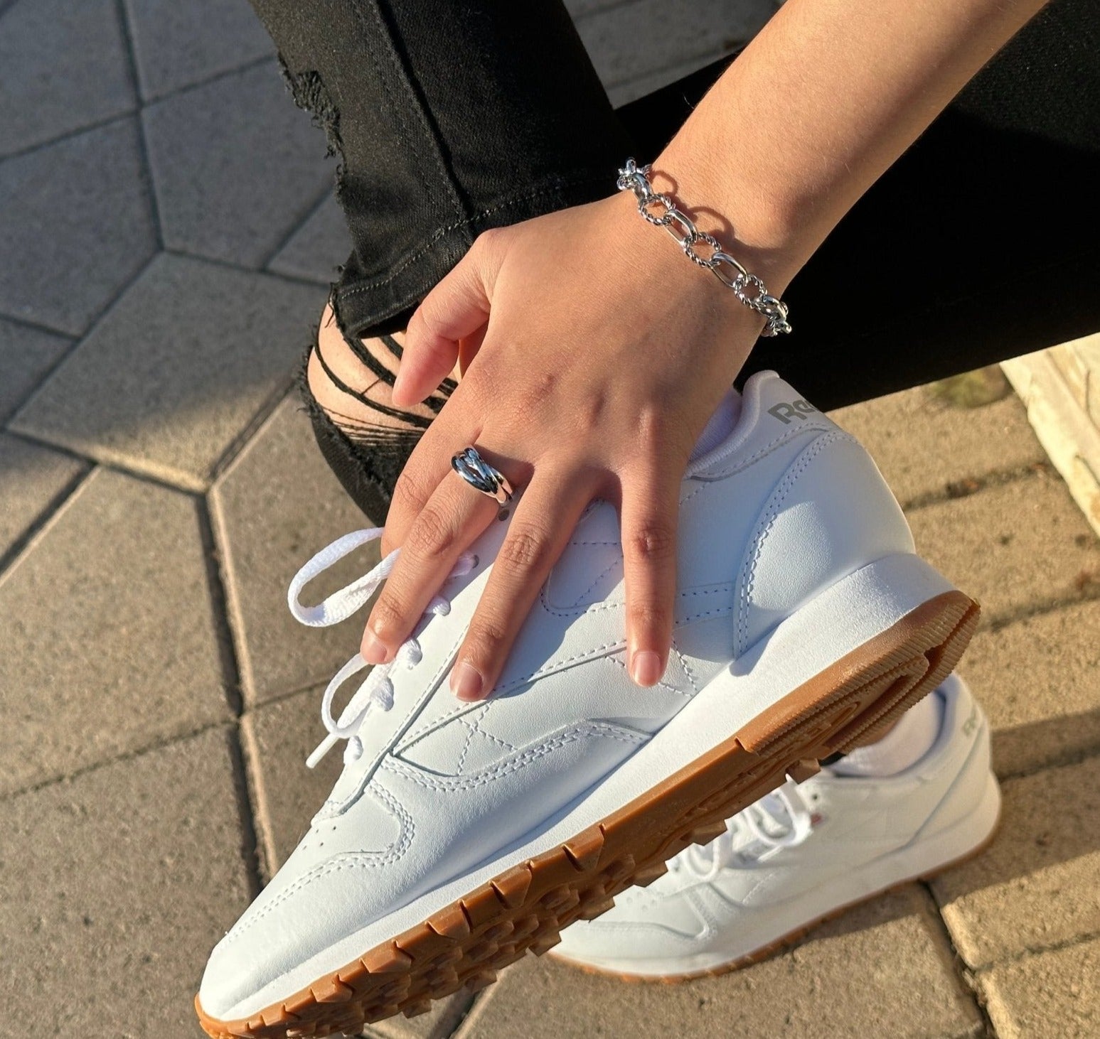 silver wide band interlocking ring