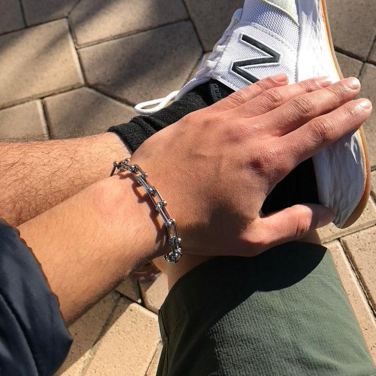 Mens Sneakers and silver bracelet look
