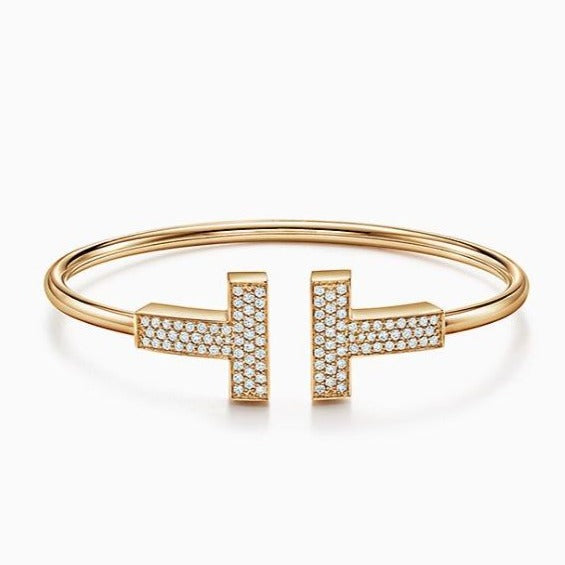 18K Gold Diamond T Bracelet - 1 Øak
