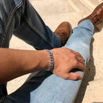 Jeans and silver chain bracelet