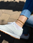 White Reebok Sneakers Gold 1 oak jewelry anklets and denim jeans