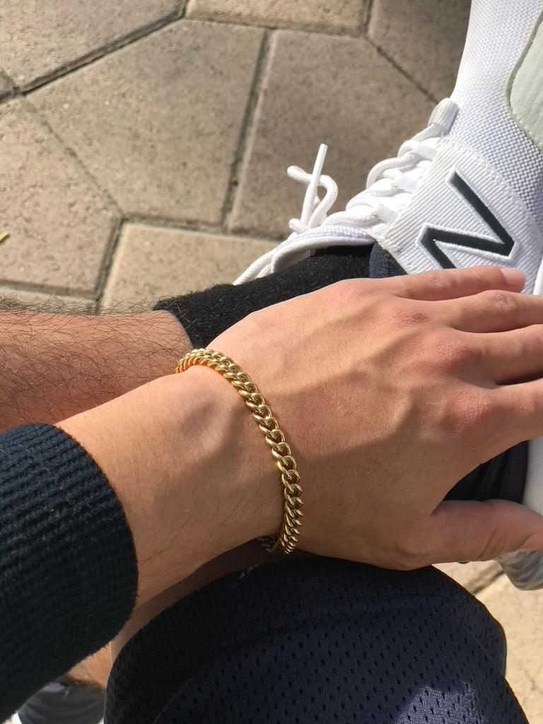 Gold 6mm chain Bracelet paired with white sneakers