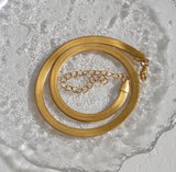 size-of-Men's-18k-Gold-Chain-Herringbone-Flat-Snake-Chain-Bracelet-at-1oaks.com